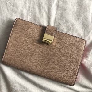 Beige clutch, pink interior